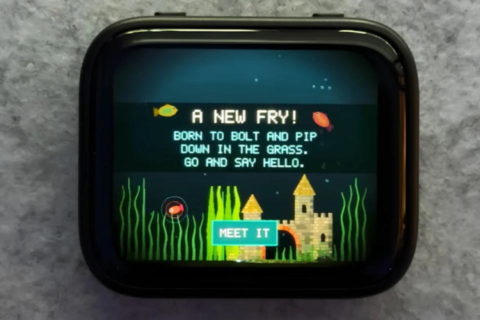 Open-Source Pocket Tank Runs a 14.3M-Parameter AI Model on an ESP32-S3 to Give Virtual Fish Their Own Brains